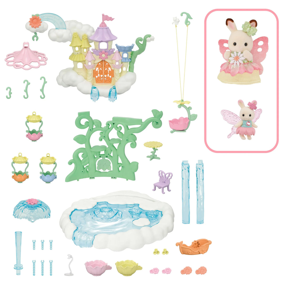 Set of toy figurines and accessories including a fairy and castle on a white background
