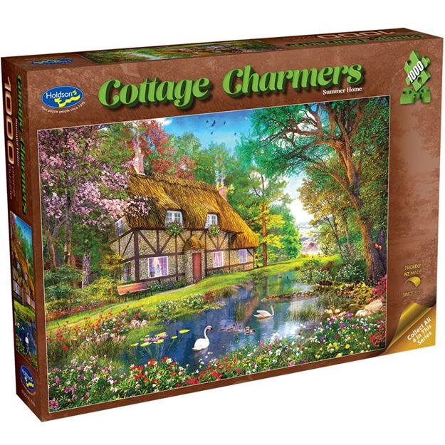 summer house puzzle box with a scenic village and pond illustration