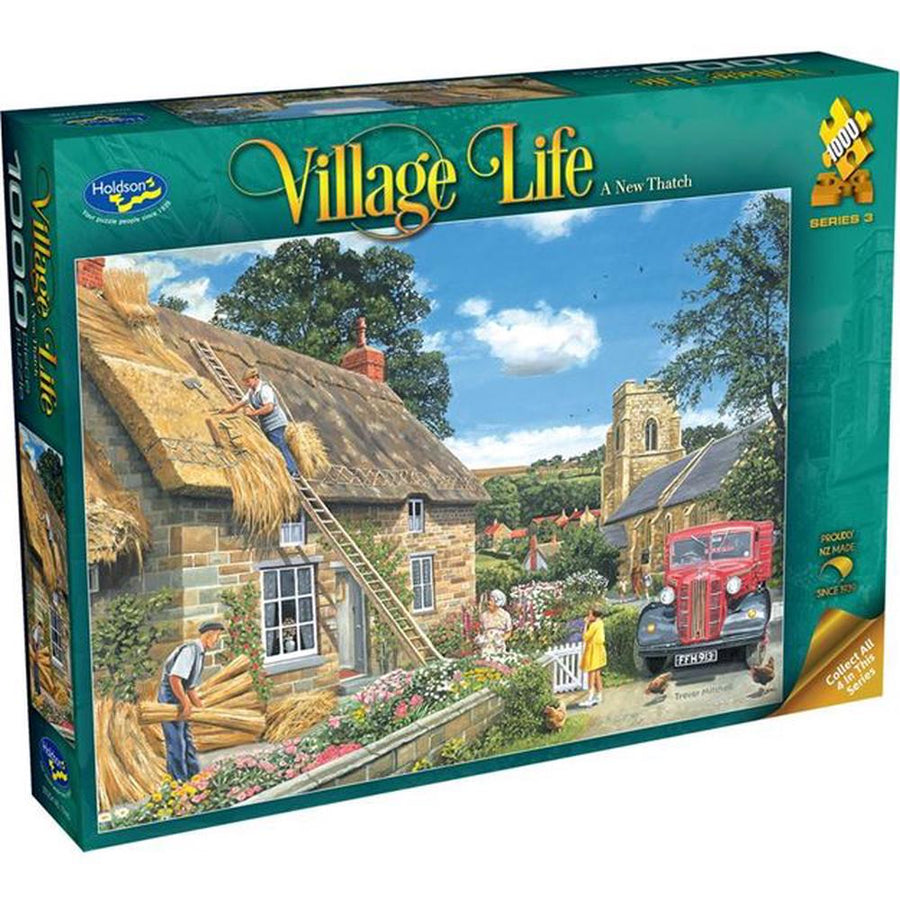 Jigsaw puzzle box titled 'Village Life' with a scenic village scene on the cover.