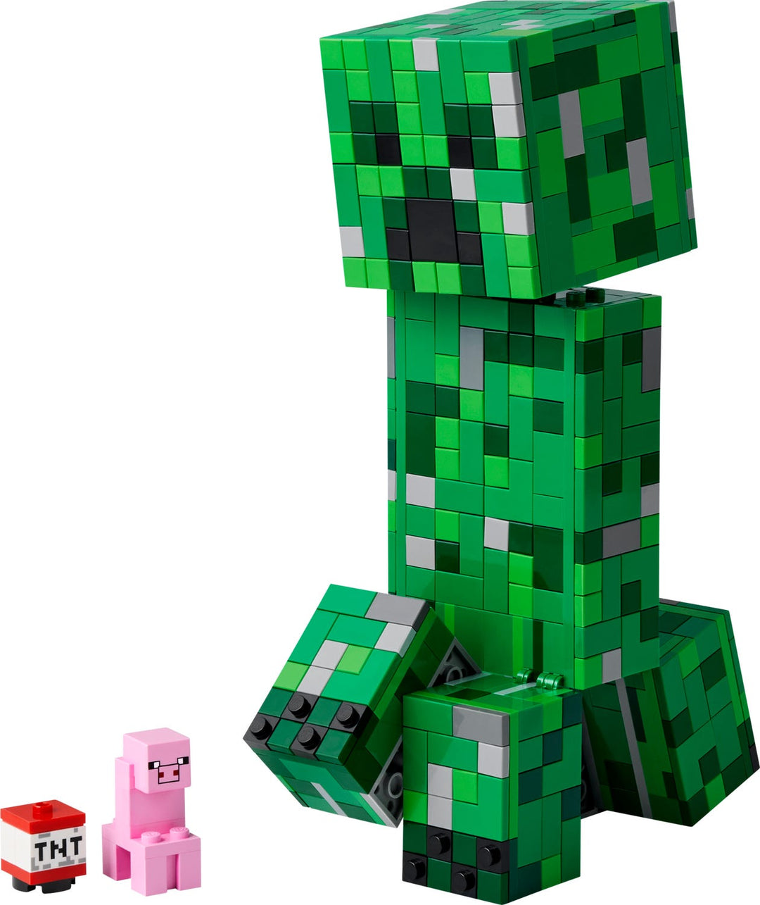 Green Minecraft creeper figure with a small pink pig and TNT block on a white background