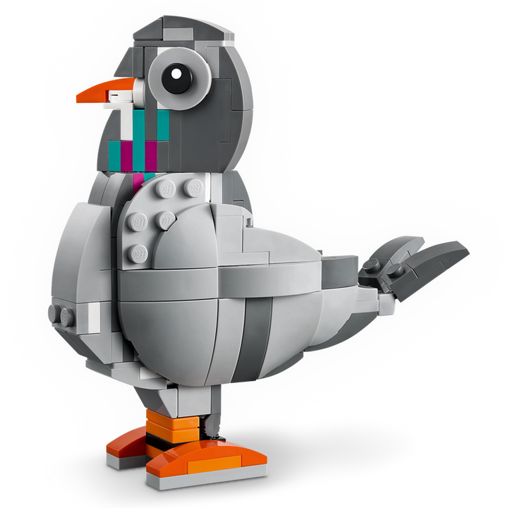 Toy bird made of interlocking bricks on a white background