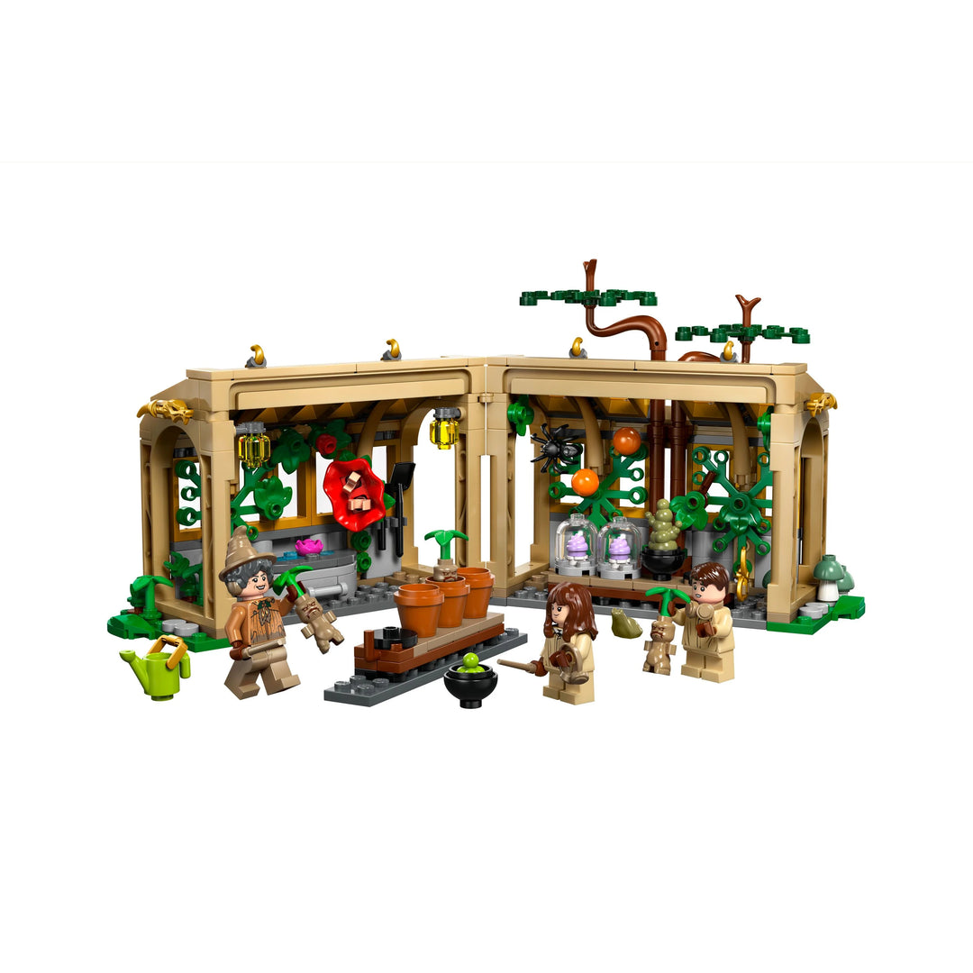 LEGO set with characters and a building on a white background
