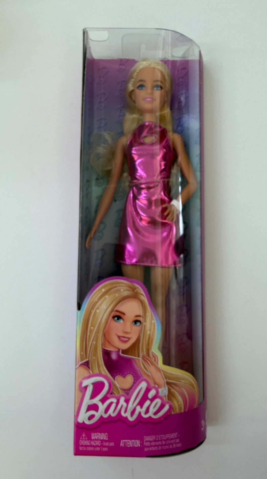Barbie doll in packaging on a white background