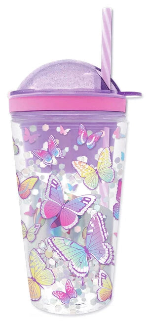 A clear plastic tumbler cup with a purple lid and straw, decorated with colorful pastel butterflies and glitter, on a white background.