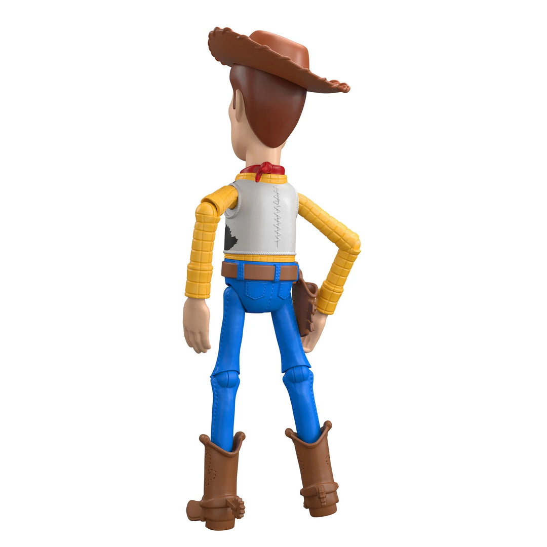 woody form toy story Toy figure of a cowboy character with a brown hat, yellow shirt, blue pants, and brown boots on a white background.