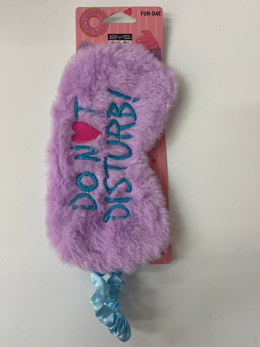 Purple plush eye mask with 'Don't Disturb' text on a white background