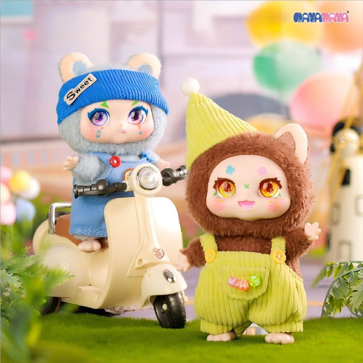 Two cute kimmon animated characters on a scooter with colorful blurred background