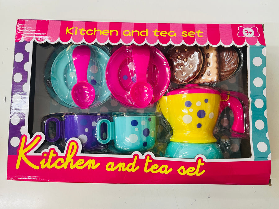 Toy kitchen and tea set packaging with colorful items on a white background