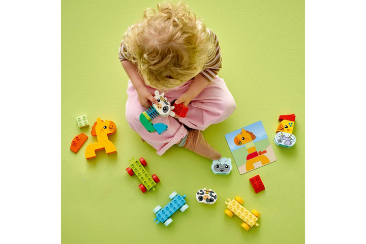 LEGO DUPLO Animal Train and child playing