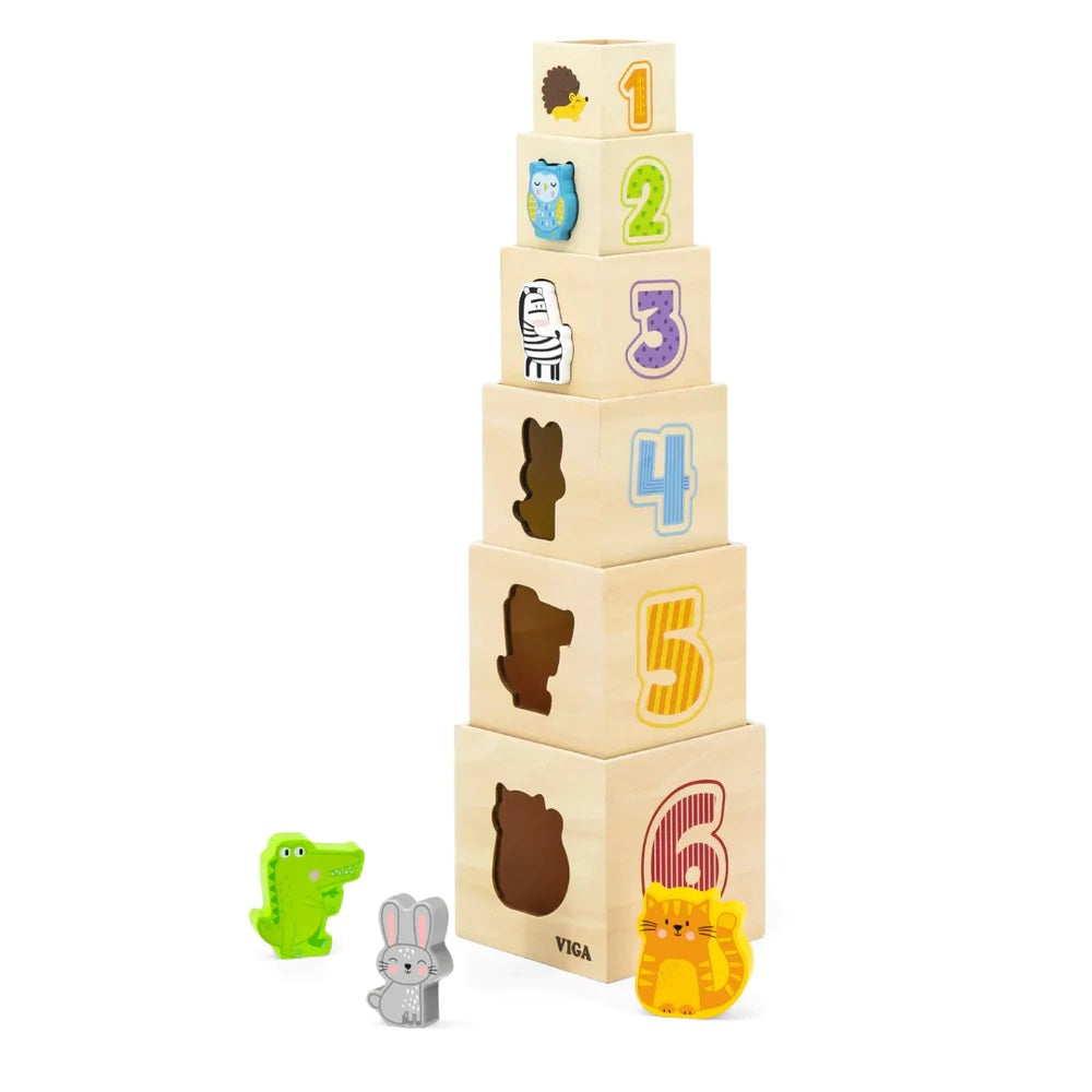 Stack of wooden blocks with numbers and animal shapes on a white background