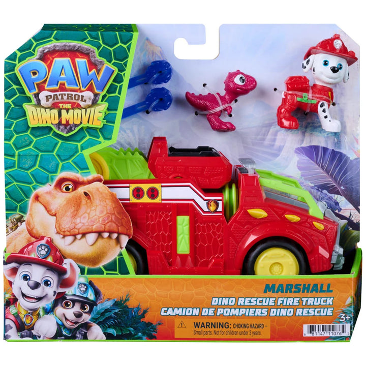 PAW Patrol The Dino Movie Marshall Dino Rescue Fire Truck toy set in its original retail packaging, featuring a red fire truck, a small pink dinosaur, and a red-and-white dog figure.