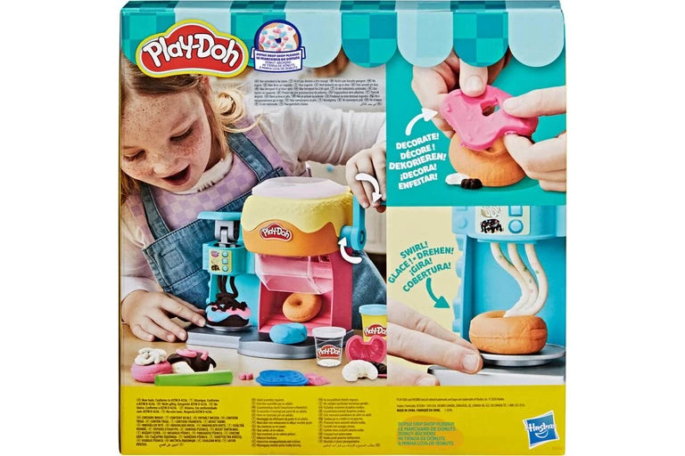 Play-Doh Play Dough Bakery toy set in its original retail packaging, featuring a child playing with the play dough machine and accessories.
