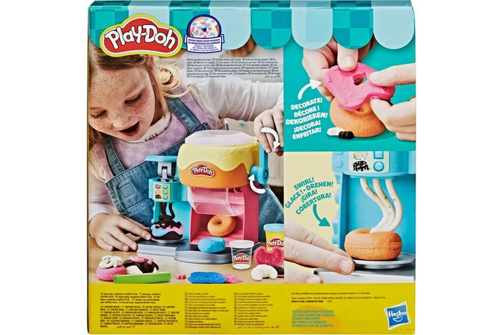 Play-Doh Play Dough Bakery toy set in its original retail packaging, featuring a child playing with the play dough machine and accessories.