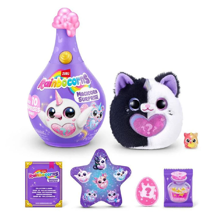 Collection of Rainbowcorns toys including a plush cat, packaging, and accessories on a white background