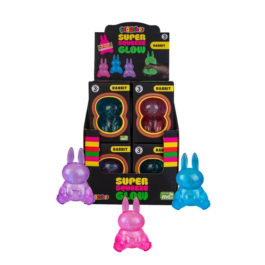 Display of colorful rabbit-shaped toys with packaging on a white background