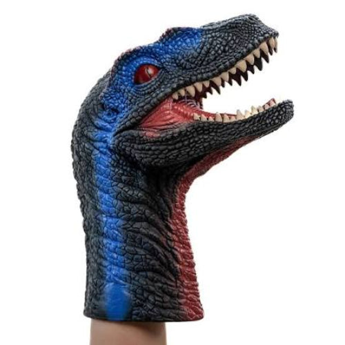 A dinosaur puppet hand covering a human hand, featuring a detailed blue, black, and red raptor head with an open mouth and sharp teeth, set against a plain white background.