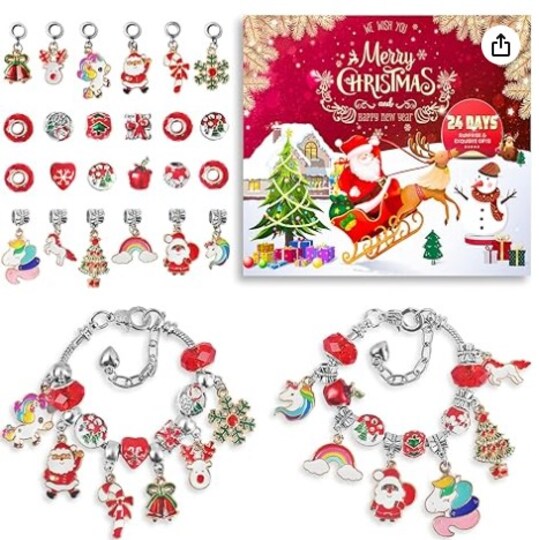 Christmas-themed jewelry set with charms and packaging on a white background