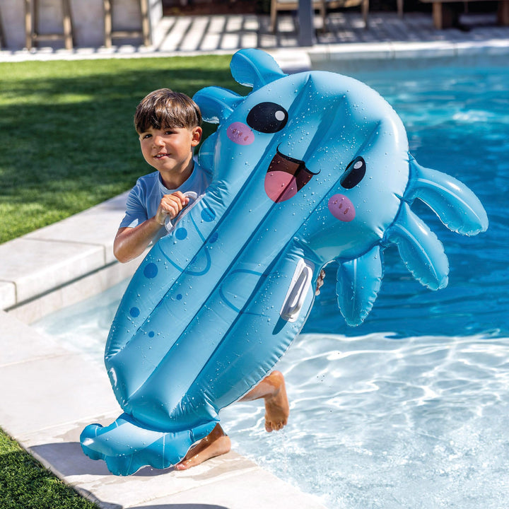 intex axolotl floatie being held by child as he runs out of pool