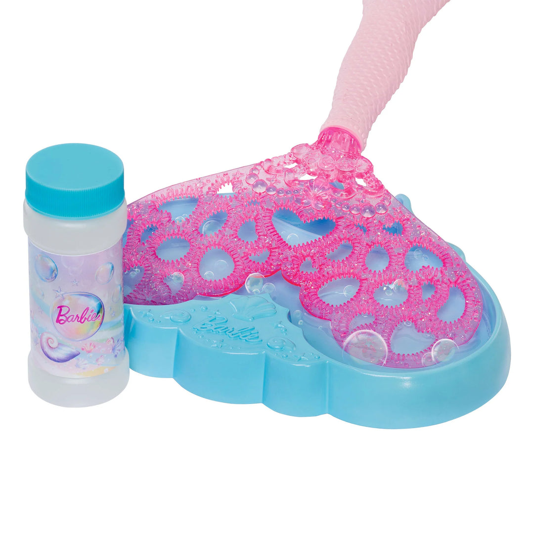 Barbie  bubble mermaid with a bottle on a white background