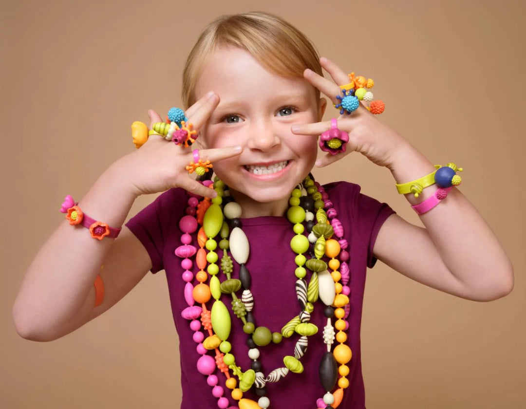 Battat Pop-Arty! - 500 pcs bead Making Kit girl wearing creations