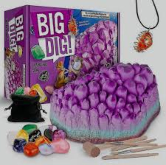 Purple gem dig kit model with educational materials on a white background