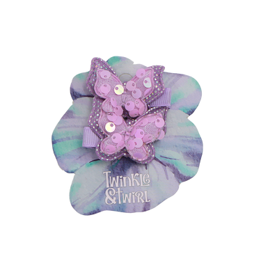 Hair bow with butterfly design and 'Twinkle & Twirl' branding on a white background