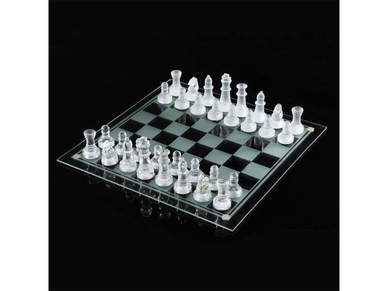 Transparent chess pieces on a clear chessboard with a black background