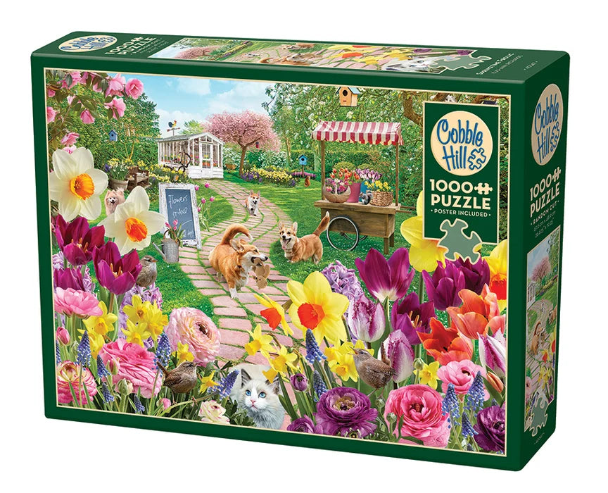 Cobble Hill puzzle box with a garden scene featuring flowers and animals.