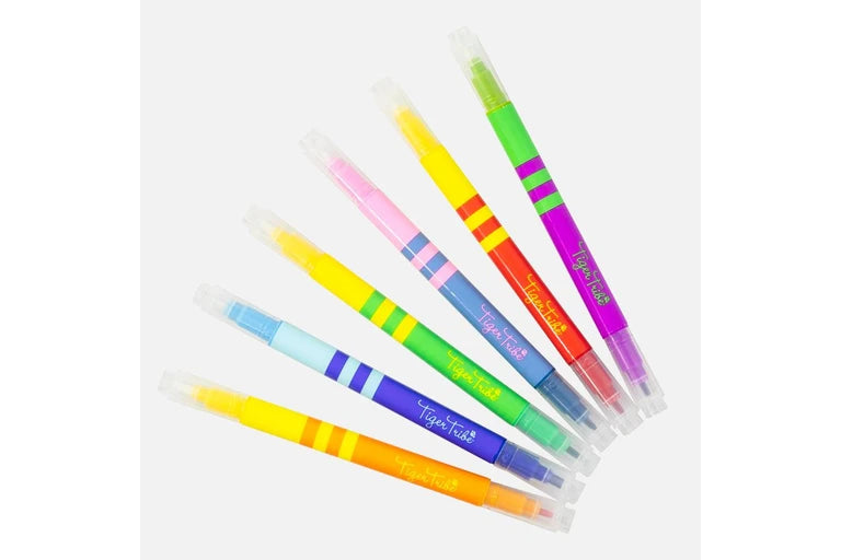 Set of colorful markers with visible brand name on a white background