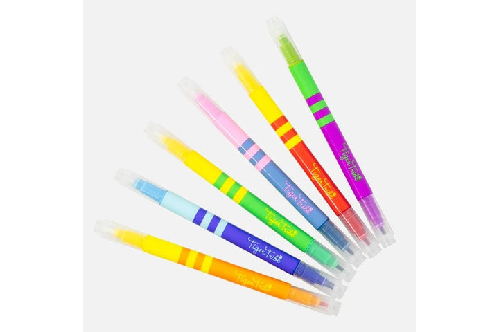 Set of colorful markers with visible brand name on a white background