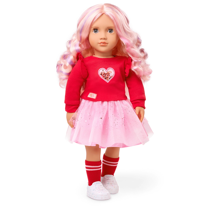 coralie our generation doll with pink hair pink skirt and red shirt with love heart design