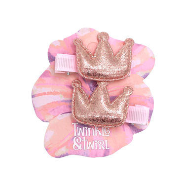 Pink and purple marbled scrunchie with gold crowns and 'Twinkle & Twirl' text on a white background