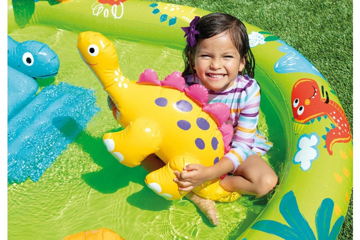 Dinosaur paddling pool with slide