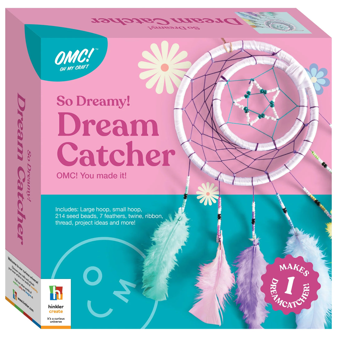 Dream catcher kit packaging with feathers and hoop on a pink background