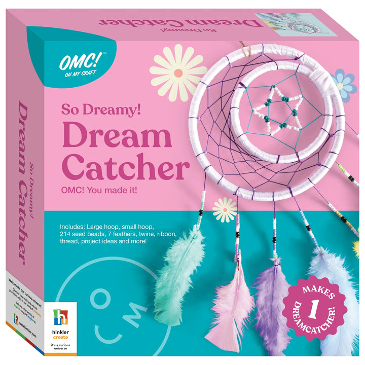 Dream catcher kit packaging with feathers and hoop on a pink background