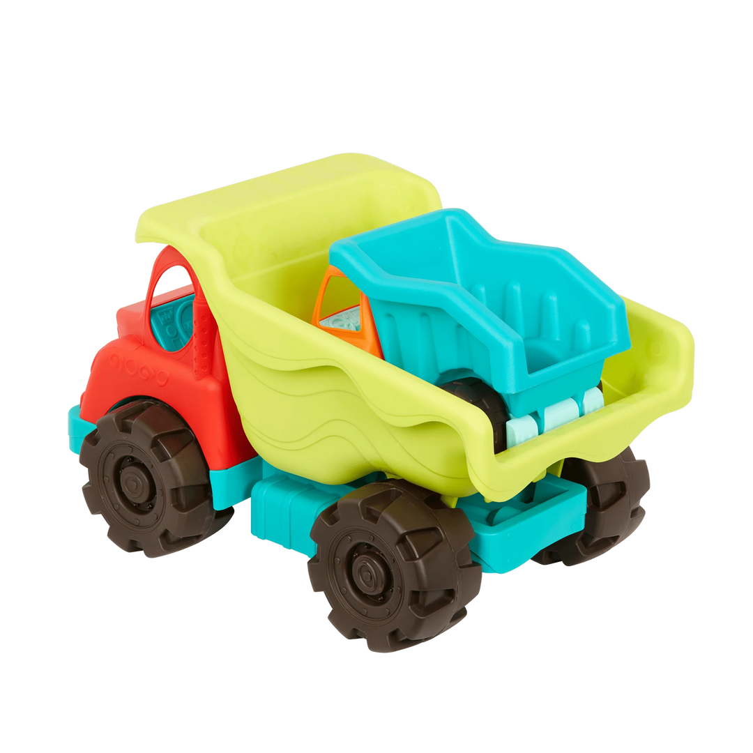 smaller dump truck loaded inside the bigger dump truck dumper
