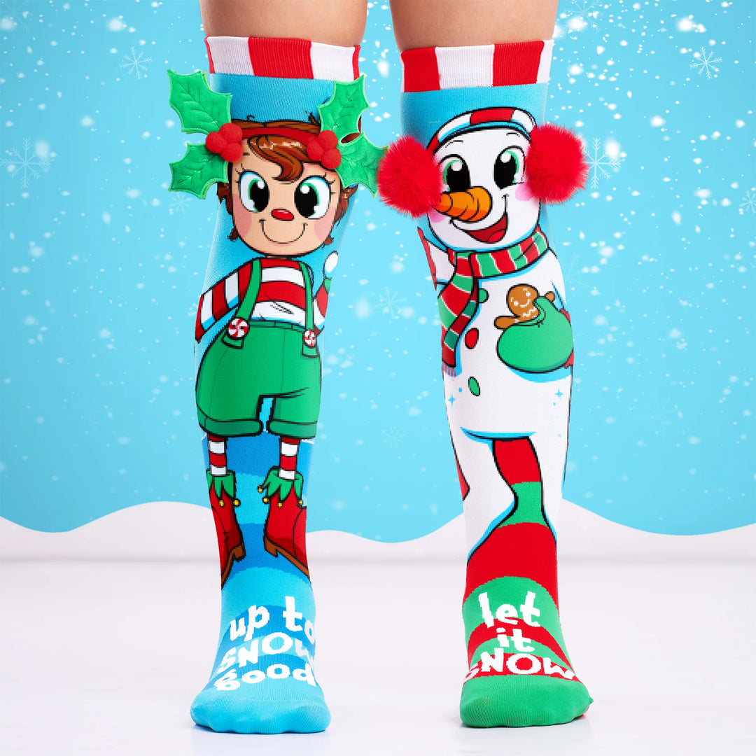 blue and green socks with elf and snowman on them on a blue and white background