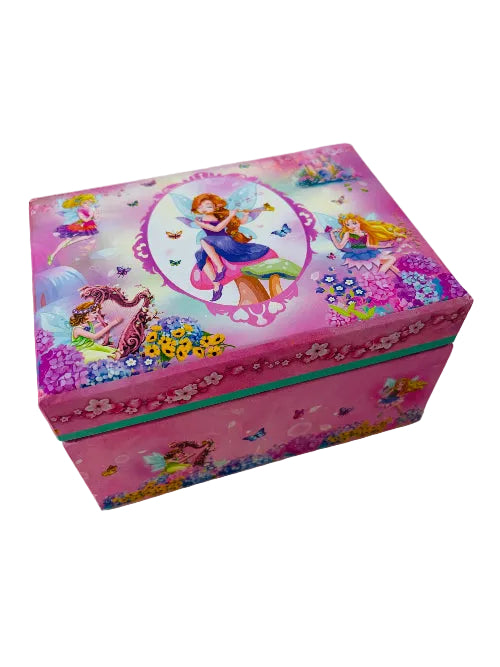 A pink decorative storage box with colorful fairy illustrations and floral patterns, photographed on a light off-white surface.
