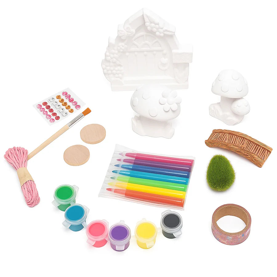Assorted craft supplies including paint, brushes, and modeling clay on a white background