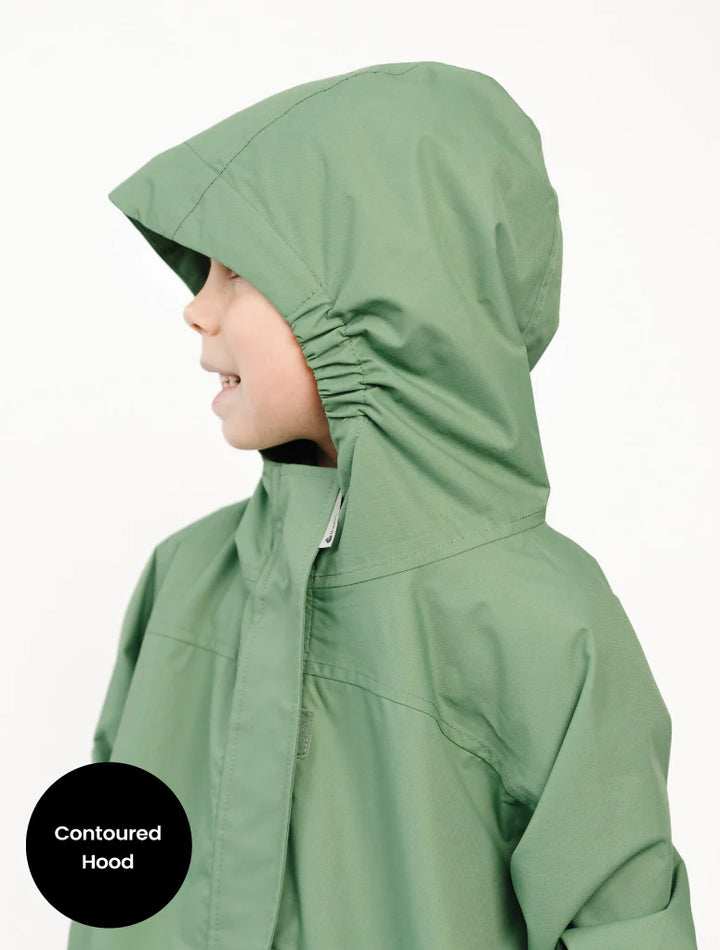 Child wearing a green raincoat with a contoured hood on a white background