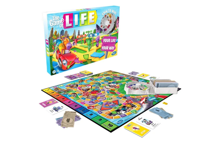 Game of Life Board game set with colorful board and packaging labeled 'The Game of Life' on a white background.