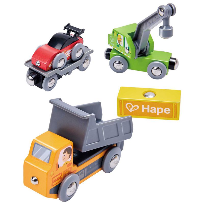 Set of toy construction vehicles with Hape logo on a white background