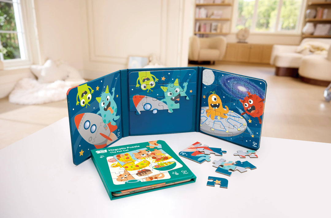 Children's educational book with colorful illustrations on a table in a living room.