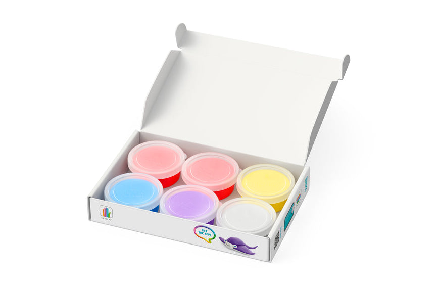 An open white cardboard box containing six small plastic tubs of colorful slime or playdough, arranged in two rows on a plain white background.