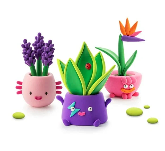 hey clay characters made of purple and pinks pots with platlife coming out of them