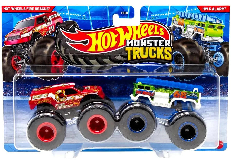 Hot Wheels Monster Trucks die-cast toy vehicles in blister packaging, featuring a red fire rescue truck and a green and white alarm truck with oversized black wheels.