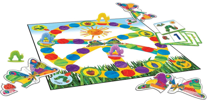 hungry caterpillar board game laid out with cards and hungry caterpillar characters on board