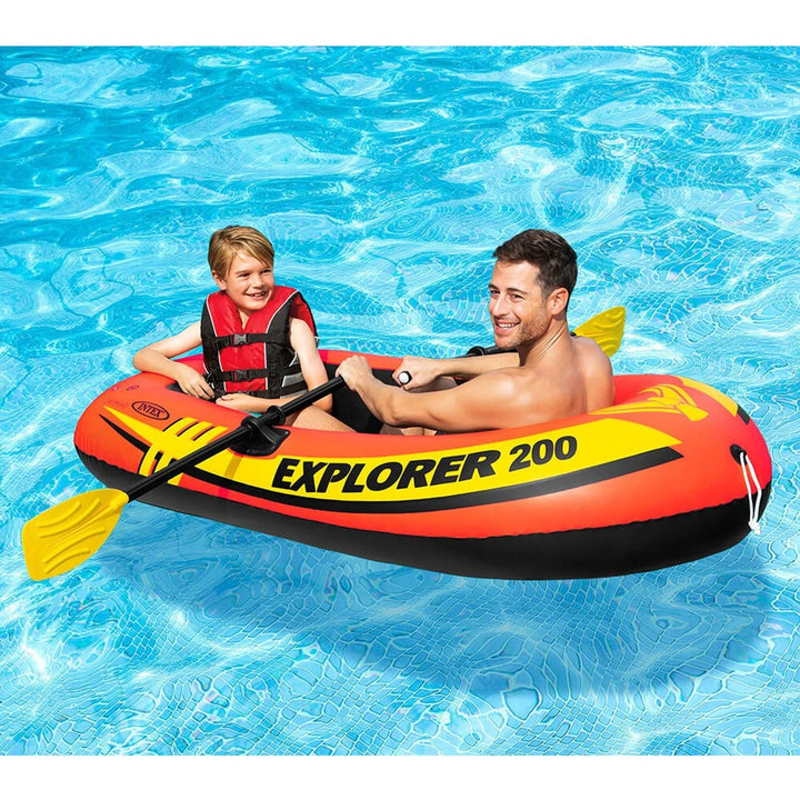 intex explorer 200 in pool with child and man sitting inside
