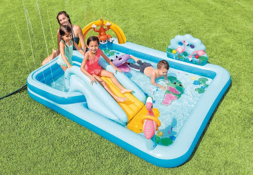 jungle pool play centre with kids playing outside on lawn
