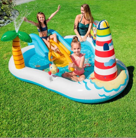 intex water play pool centre being used by 2 kids and a lady on a green lawn